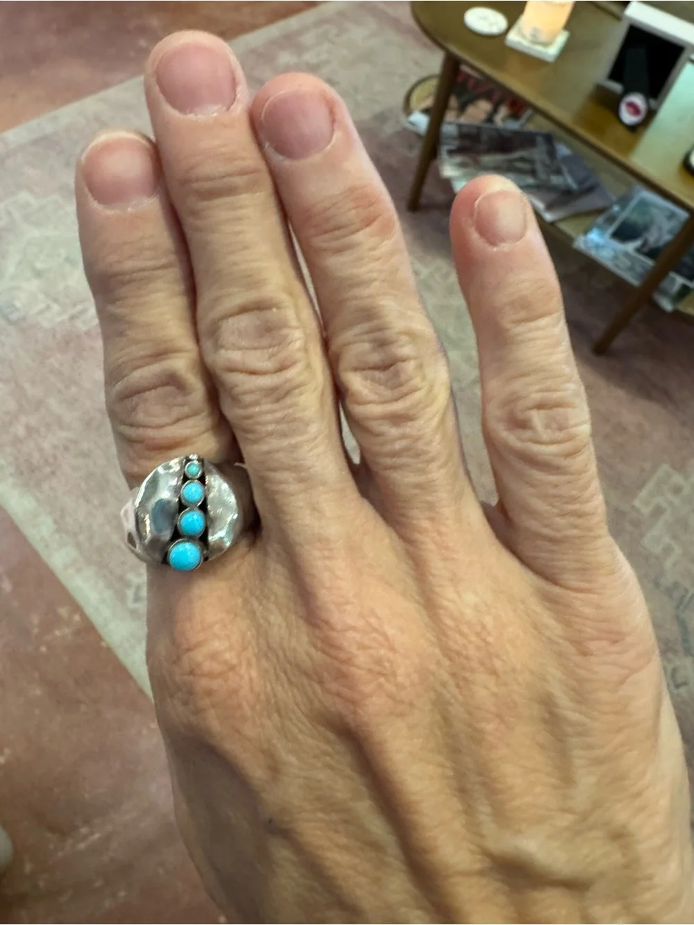 Unique Sterling and turquoise modern statement ring size nine. Stamped by artist